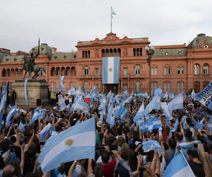 Supporters of Argentina's President Mauricio Macri attend a rally in support of Macri, in Buenos Aires, Argentina, Saturday, Dec. 7, 2019. Despite losing to opposition candidate Alberto Fernandez in the recent presidential elections the conservative leader garnered 40 percent of the vote and his "Let's Change" political movement look set to continue being an ongoing force in Argentine politics. (AP Photo/Natacha Pisarenko)